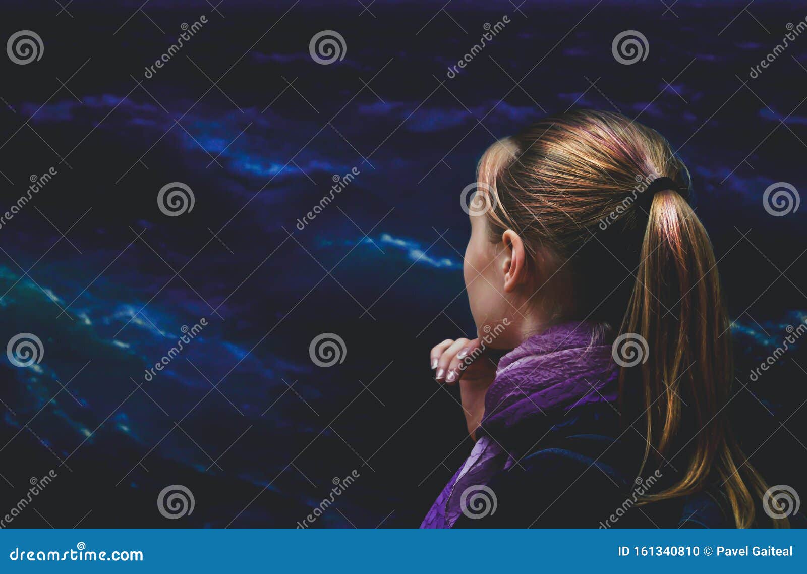 a girl stands opposite aivazovskyÃ¢â¬â¢s painting Ã¢â¬Åamong the wavesÃ¢â¬Â